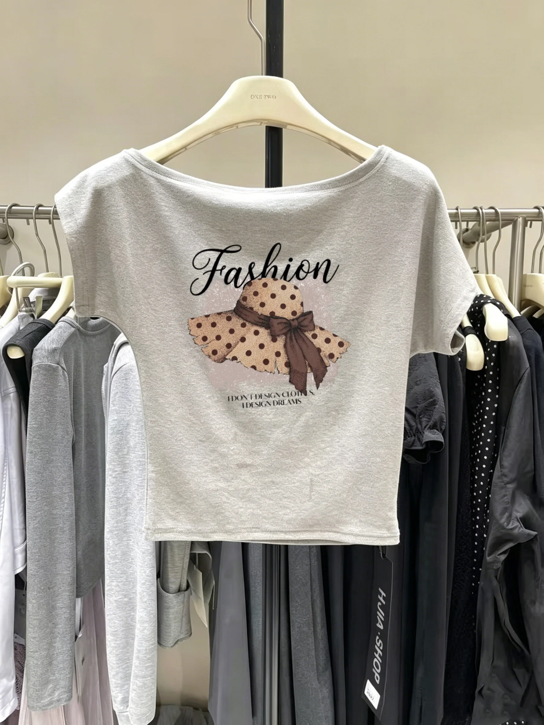 Dongda Gate Fashion Spicy Girl Diagonal Shoulder Short Sleeve T-Shirt Women Summer New Cartoon Anti-aging Printing Slimming Top