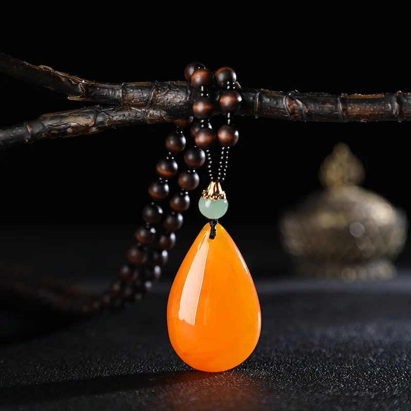 Ethnic style imitation beeswax drop necklace nucleus beads long sweater chain female imitation amber pendant