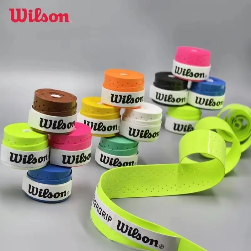 Wilson 12 ชิ้นแร็กเก็ต Sweatband Overgrip เทนนิสแบดมินตันการฝึกอบรมเหงื่อดูดซับมือกาวเทนนิสอุปกรณ์เสริม PU Non Slip Grip