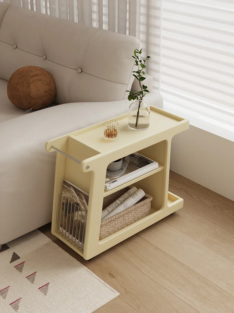 

Cream-style sofa, a few small carts, movable coffee table, living room, household storage, shelves, side cabinets