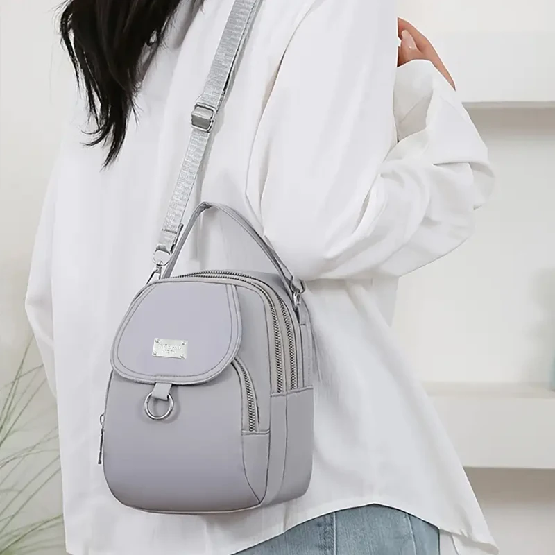 Grace Compact Convertible Crossbody-Rucksack, einfarbige, leichte Nylontasche mit abnehmbarem breitem Schultergurt – Detail 9