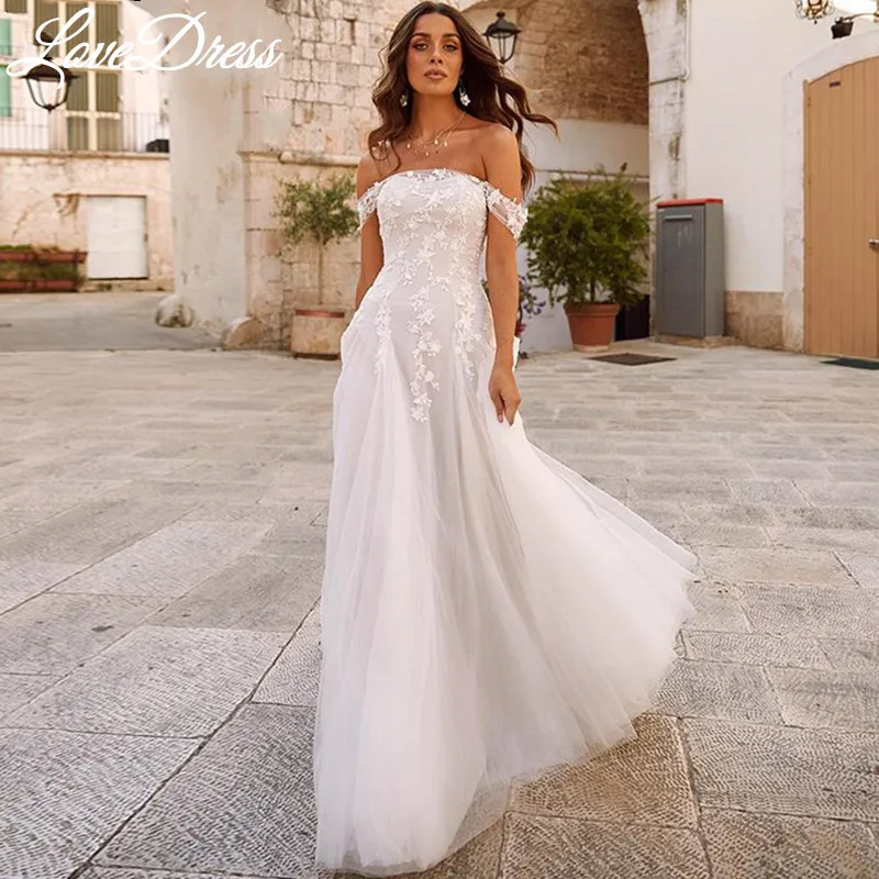 فستان زفاف من LoveDress ذو رقبة قارب مثير للعروس على شكل حرف a فستان عروس أنيق مكشوف الأكتاف مزين بالدانتيل بدون ظهر Vestido De Novia