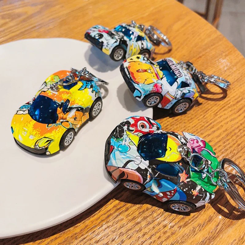 Creative Alloy Pattern Pull Back Sports Car Key Chain, Exquisite Children's Toy Car Key Chain Pendant Claw Machine Small Gift.