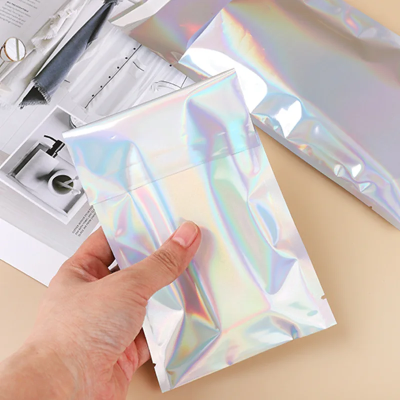 100Pcs Laser Film Packaging Pouch Self-adhesive Courier Bags Holographic Envelope Mailer Postal Shipping Bag