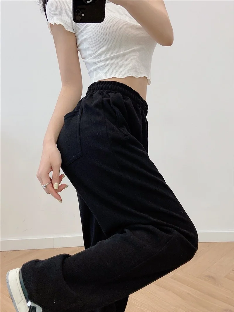 กางเกงขายาวเอวสูงทรงหลวมสบายสไตล์ลำลอง ขาบาน ปลายขาจั๊ม ผ้ามีความยืดหยุ่น แฟชั่นสตรีท ไซส์พลัส