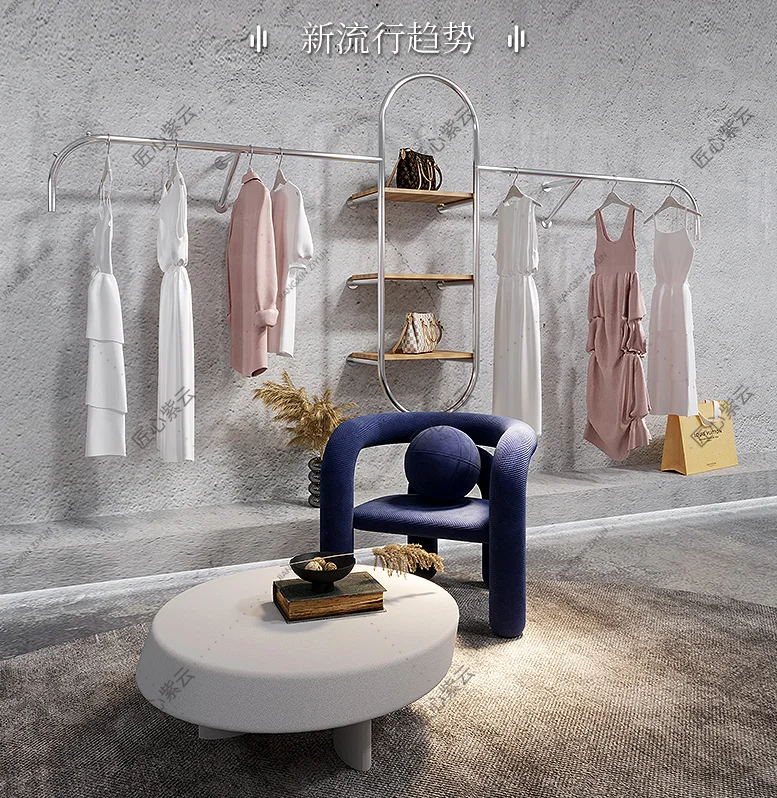 

Stainless steel silver clothes rack on the wall of high-end clothing store display rack of women's clothing store
