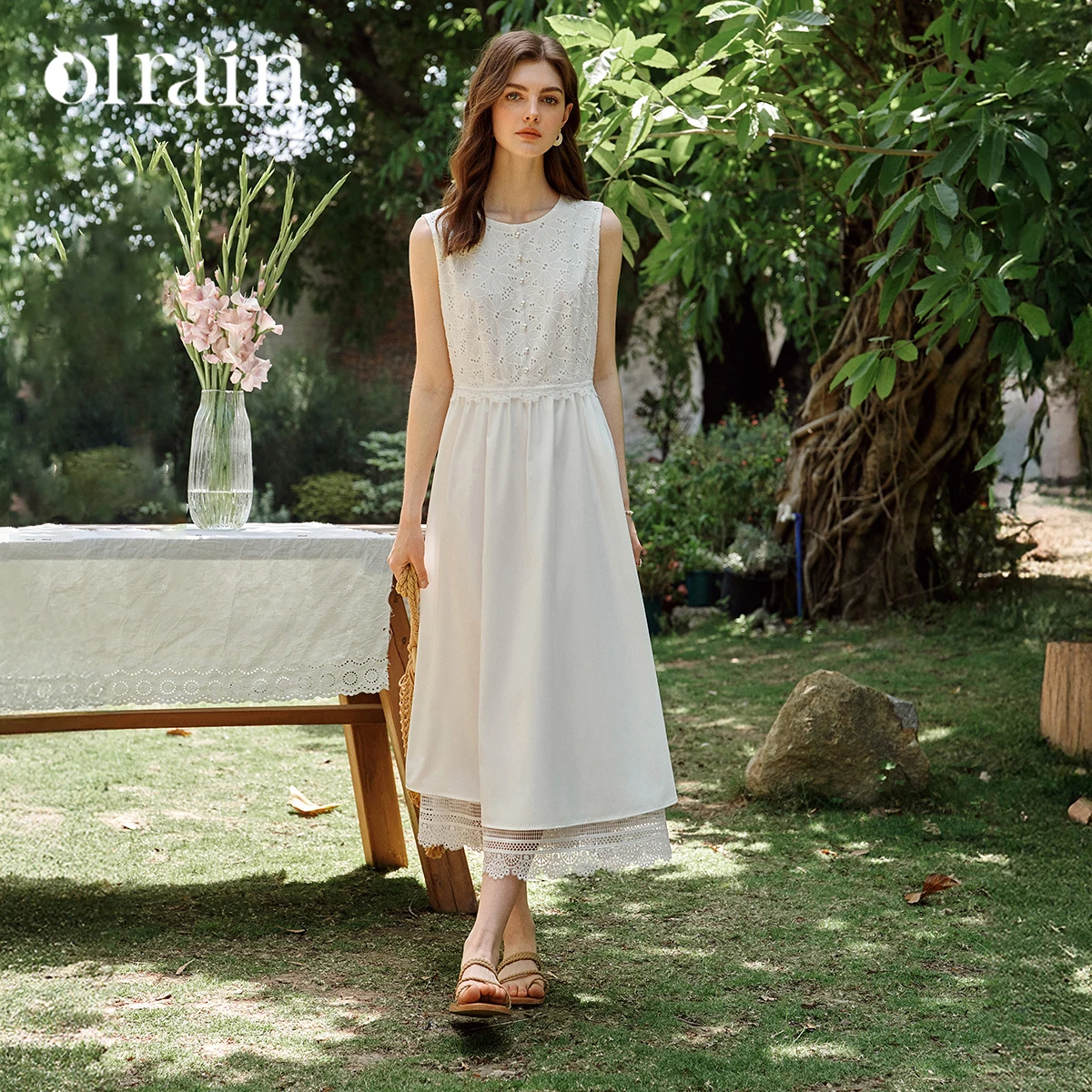 

OLrain Women's Long Sleeveless Dress 2026 Summer White Lace Hollow 100% Cotton French Hollow A-Line Female Clothing O57XL99558