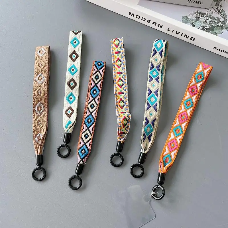 Bohemian Woven Phone Wrist Straps With Ethnic Geometric Patterns And Durable Metal Clasp Perfect For Daily Use Carrying Phones