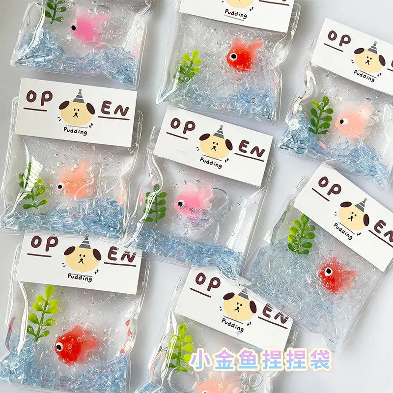 

Маленькая сумка для декомпрессии с золотой рыбкой, игрушка для декомпрессии с медленным отскоком, супер мягкая водная лопатка с пузырьками, зажим для золотой рыбки, музыка.2025