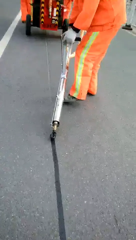 YUGONG سعر المصنع آلة تعبئة الكراك الطريق السريع ختم المشترك