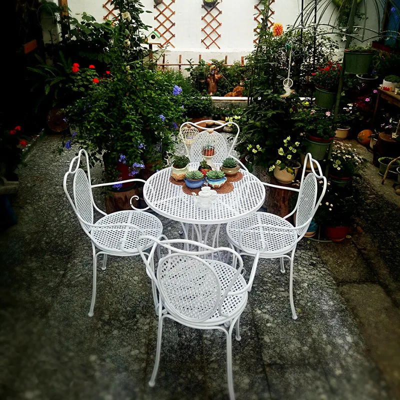 

Outdoor tables and chairs wrought iron courtyard outdoor tables and chairs