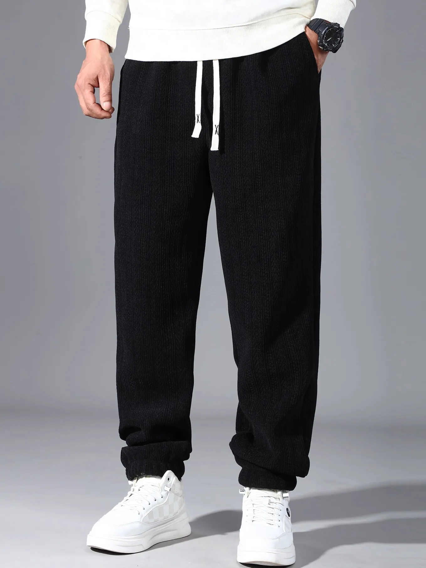 

Мужские зимние повседневные брюки увеличенного размера, свободные, на флисовой подкладке, теплые, с завязками, из хлопка и полиэстера...