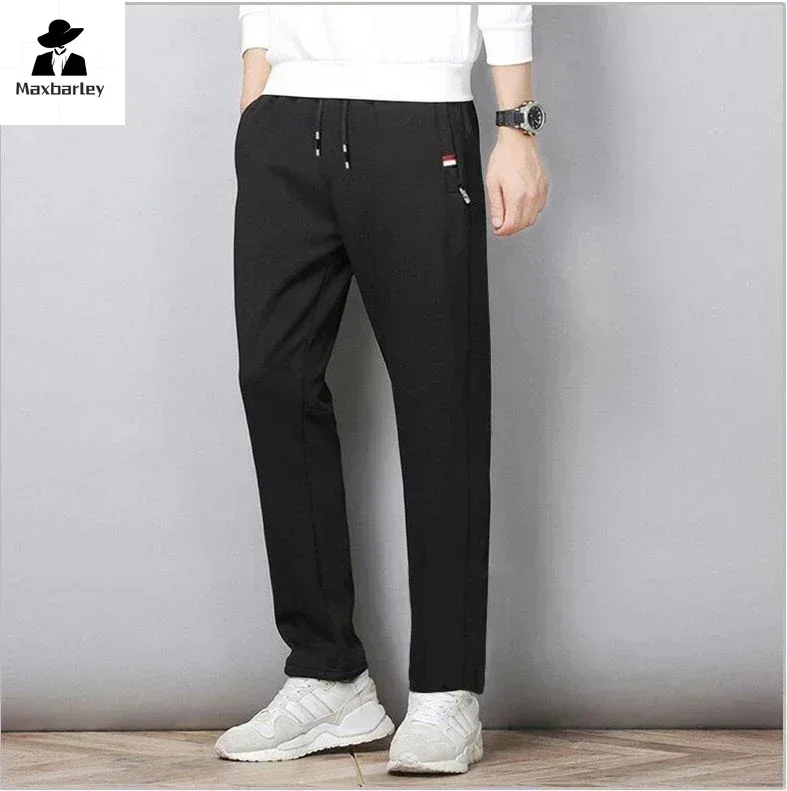M-8XL Large Casual Pants Autumn Men's Solid Color Fitness Jogging Straight Leg Sports Pants Windproof and Warm Cotton Pants 2024