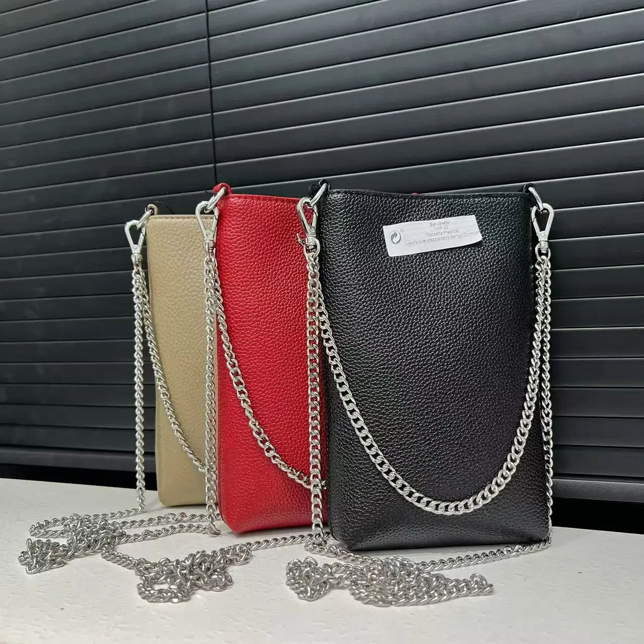 

Ladies' fashionable light luxury design shoulder bag straight tube solid color simple lychee pattern diagonal cross bag