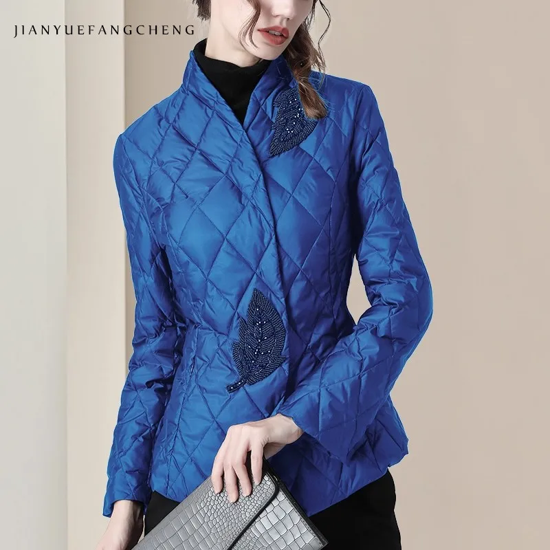 أزياء المرأة سترة شتوية طويلة الأكمام المطرزة الديكور الأصفر البخاخ معطف شتاء دافئ أعلى الكورية عارضة أسفل السترات #1