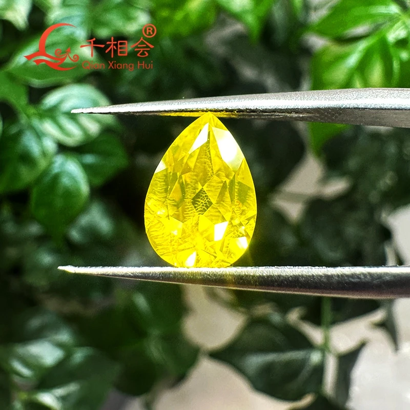 

Strong fluorescent yellow pear shape lab grown Yttrium Aluminum Garnet with inclusions gemstone jewelry YAG