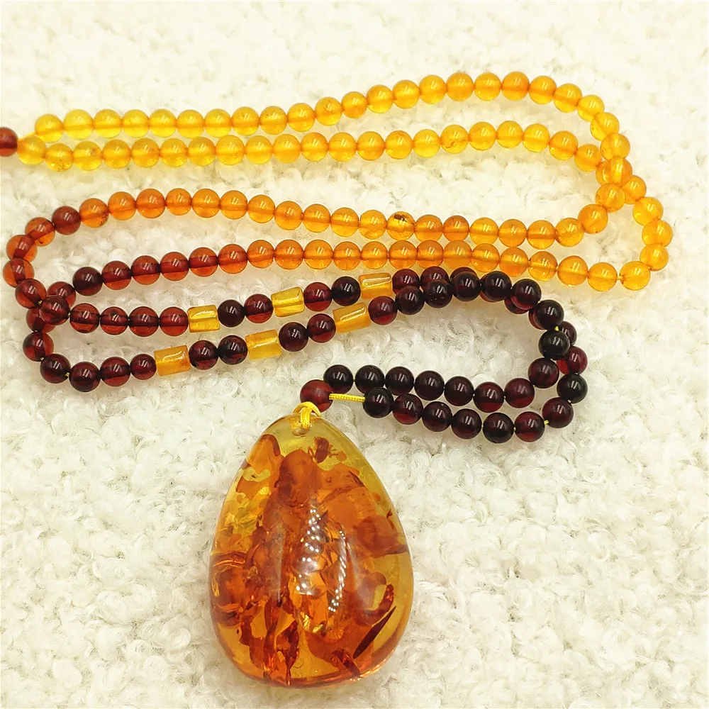 

Natural Piebald Amber Pendant Beads Neckalce Yellow Amber 33xx23x14mm Gemstone Pendant Necklace Jewelry AAAAA