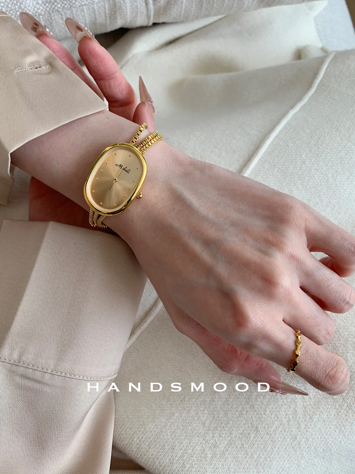 Luxury women's watch, high-end gold oval dial, tassel chain design belt buckle, ladies quartz watch, women's gift, women's watch