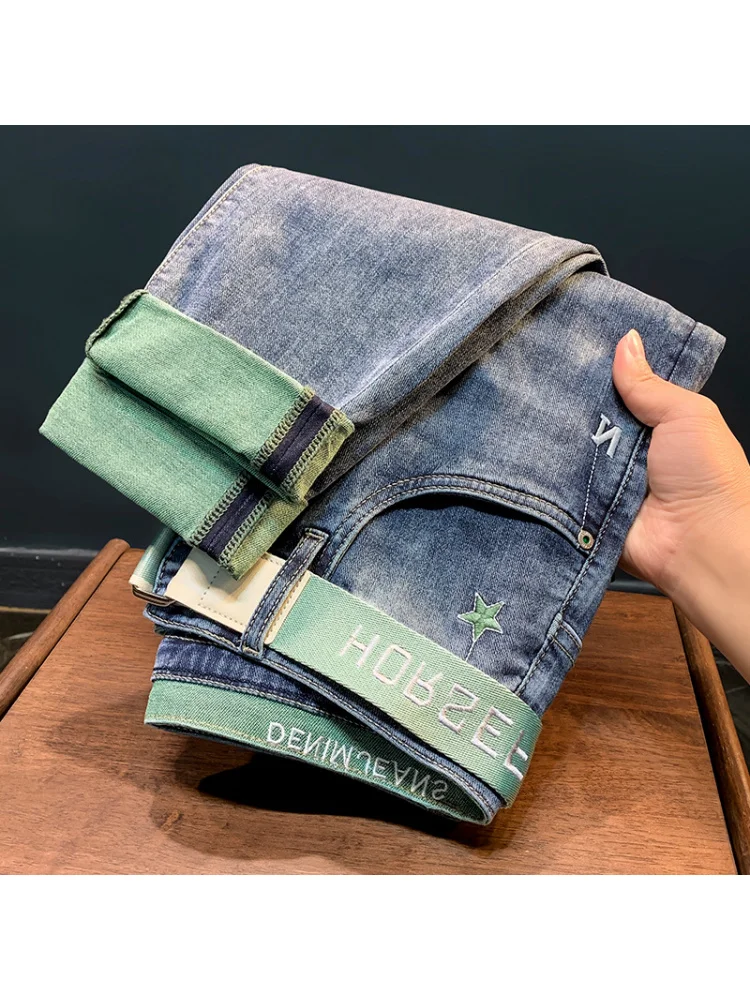 Wysokiej klasy jeansy męskie wiosna/lato 2025 cienkie haftowane nadruki koreańska wersja mikroelastyczne spodnie z małymi nogawkami