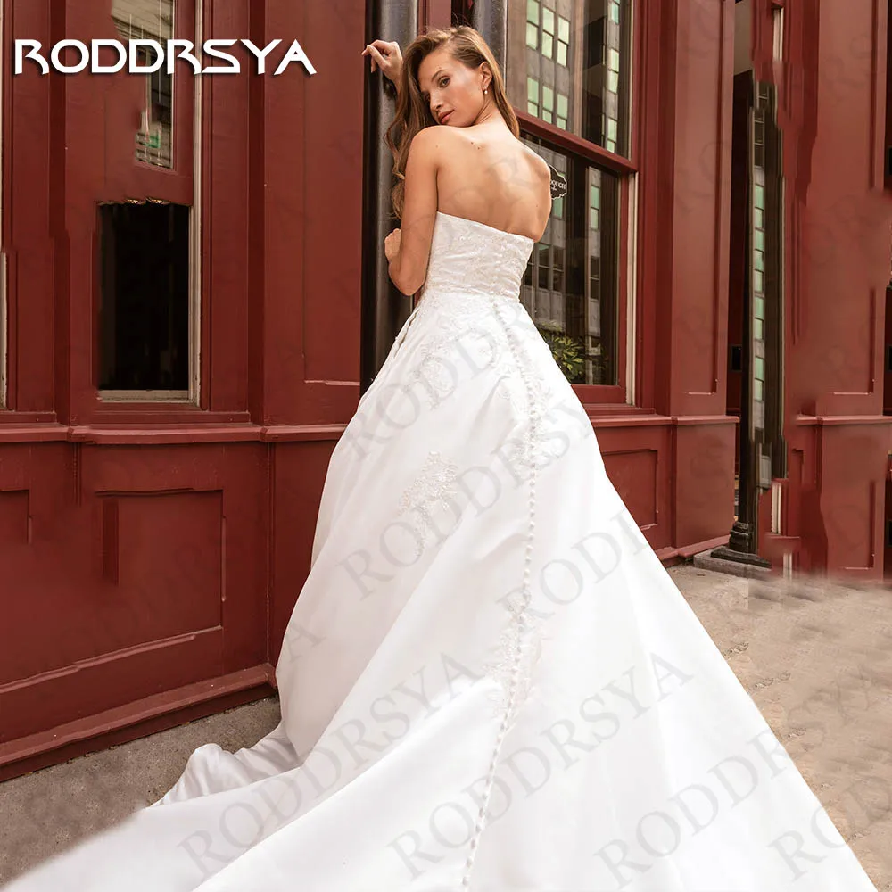 Roddrsya vestido de novia träger loses hochzeits kleid eine linie braut elegante rücken freie applikationen satin spitze brautkleid ärmel los Vestido De Novia 2024 Trägerloses Brautkleid A Line  Braut Elegant Rückenfre