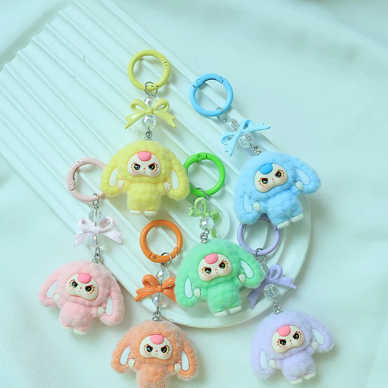 

New cute bow-shaped big-eared rabbit plushie charm, cartoon keychain, small doll, student schoolbag decoration accessory