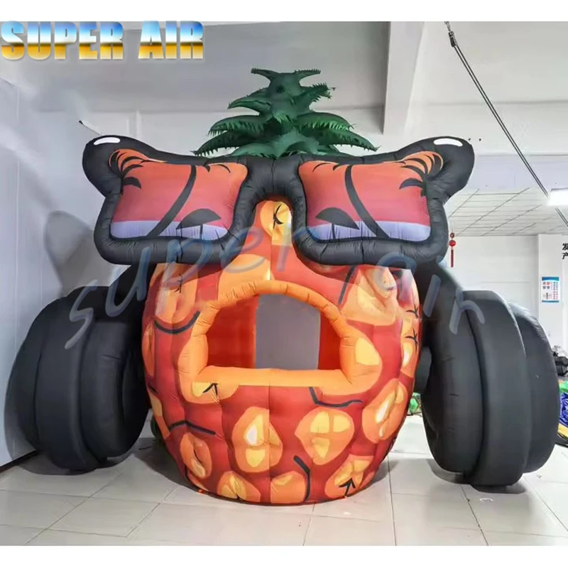Nadmuchiwany ananas z słuchawkami do dekoracji sceny na festiwal muzyczny na świeżym powietrzu
