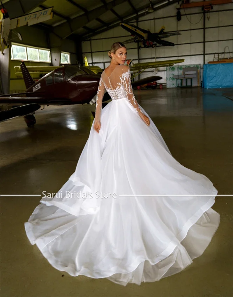 Sheer Neck with Heavy Crystals Long Sleeves White Wedding Dress Organza and Tulle A-line Bling Bridal Dress