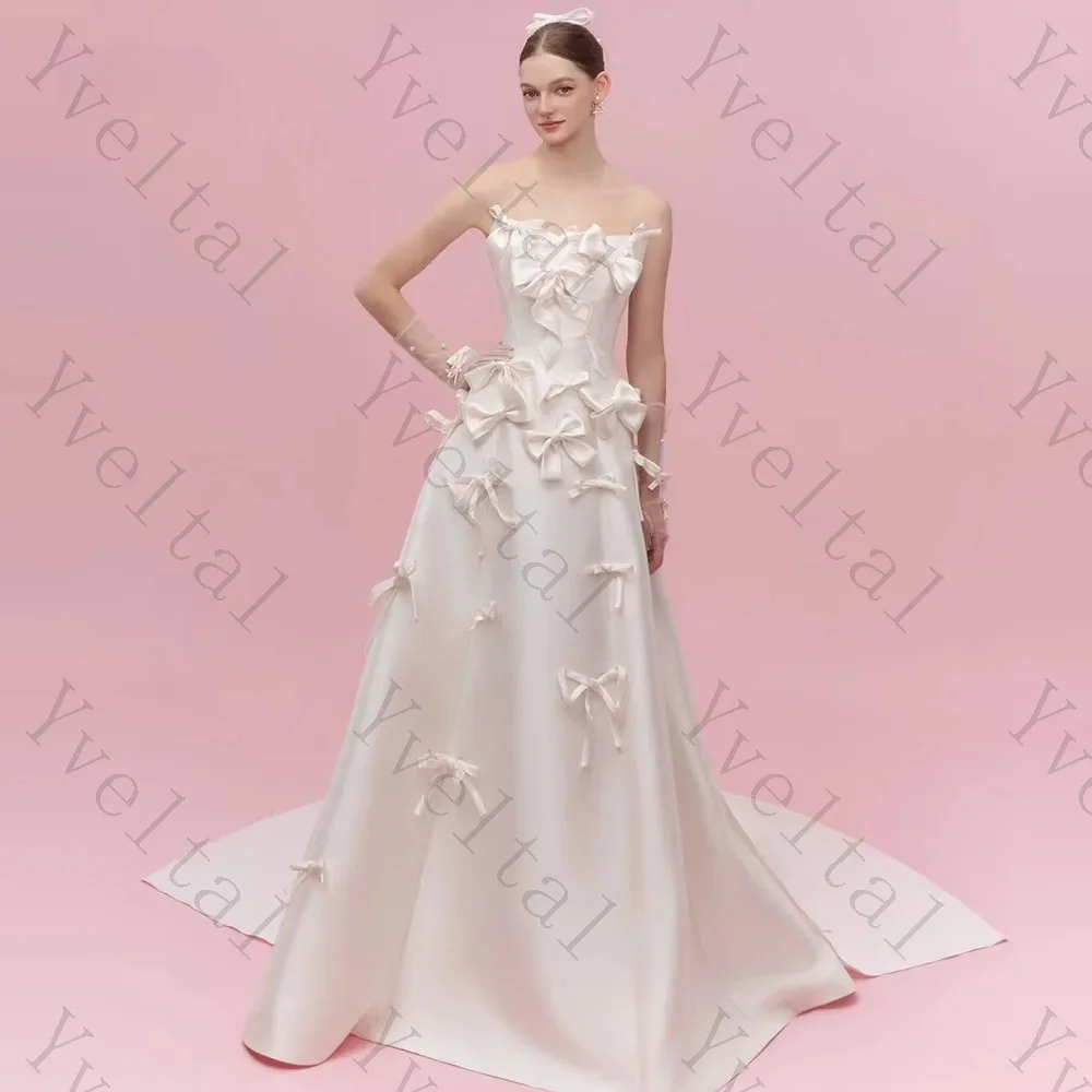 Customized Women's Elegant Strapless Wedding Dress Handcrafted Bows Fitted Bodice A‑Line Sweep Train Bridal Gown for Ceremony