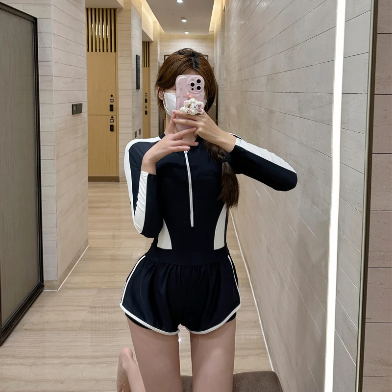 

Новинка 2025: Горячая распродажа! Женский слитный купальник с длинным рукавом, корректирующий фигуру, черный, для повседневного использования.