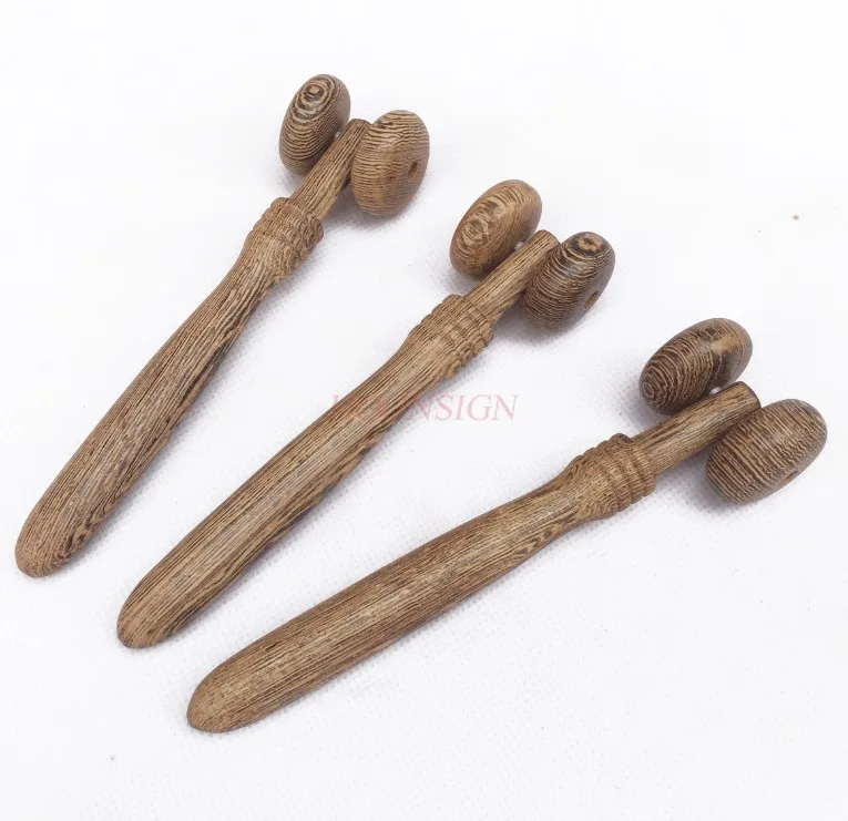 

Wooden massager facial massager Nose eye nose bridge roller two wheel push nose massager