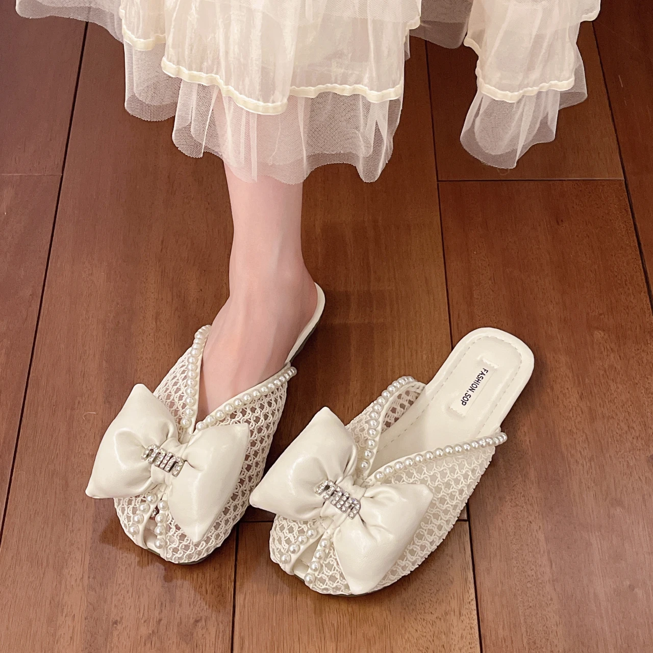 المرأة الجنية الرياح بلون باوتو النعال الصيف موضة جديدة الكورية القوس الديكور جوفاء تنفس نعال مسطحة. #6