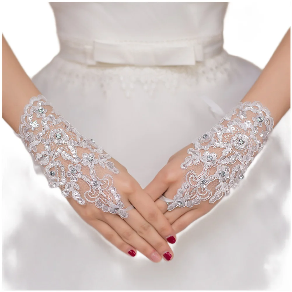 Lightweight bridal fingerless gloves featuring elegant lace embroidery for use at weddings parties and operatic performances
