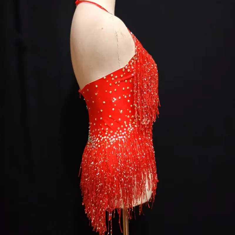 ชุดบอดี้สูทเปิดหลังสีแดงแต่งพู่ห้อยสำหรับผู้หญิง สไตล์ลาติน เต้นโพลแดนซ์ โชว์ แต่งขอบ แต่งเล็บ  ชุดรัดรูปสำหรับไนท์คลับ ดีเจ นักเต้น แสดงบนเวที