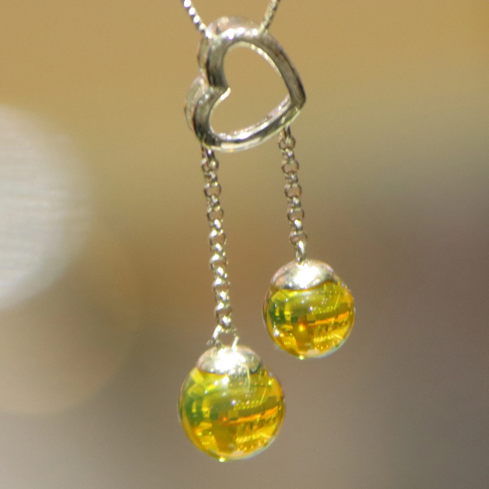 

Pure Silver Natural Mexican Blue Amber Heart Pendant with Two Blue Amber Beads 7mm and 9mm