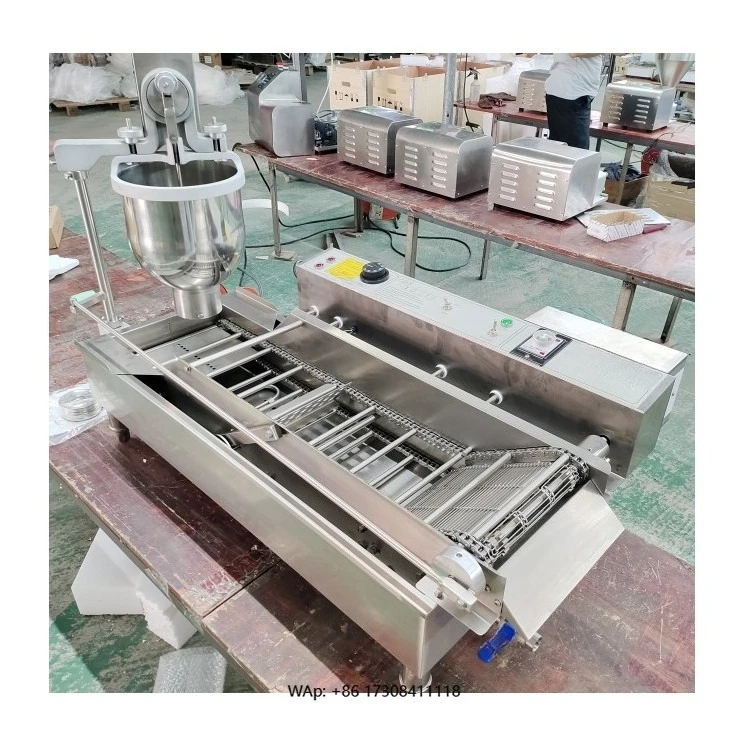 

Manual donut roasters, and commercial plum donut machines