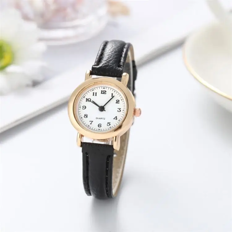 Klassische Retro Temperament kleine Uhr Damen kleine runde Uhr Quarz gürtel Armbanduhr Freundinnen einfache Mori Trend