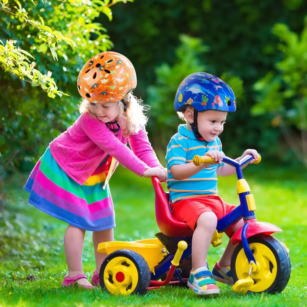 M87K Lindo casco de bicicleta para niños y niñas, cascos cómodos de seguridad ajustables para patinaje en ciclo multideportivo, mundo de dinosaurios naranja