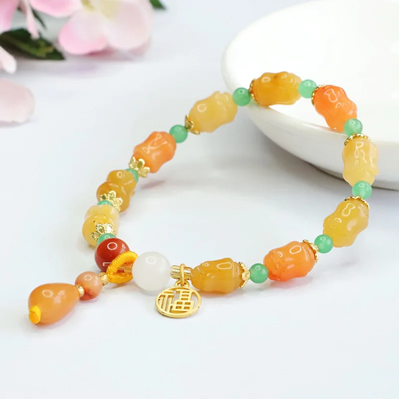 

Golden silk jade bracelet, colorful jade magnolia bracelet.