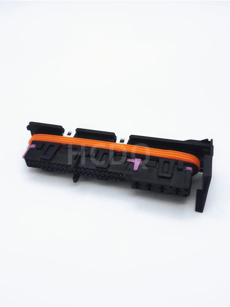 The original 1928404563 automotive connector plug housing and connector are supplied from inventory.