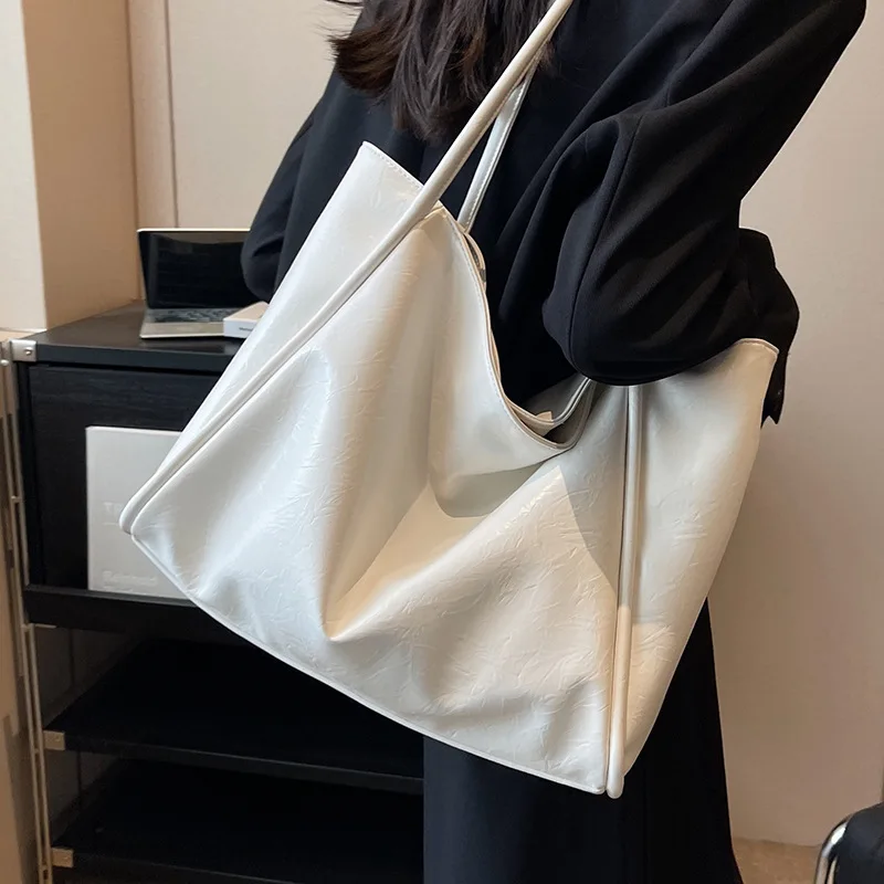 

New Women Luxury Solid Tote Bag Girl Fashion Versatile Large Capacity Commuting Handbags Single Shoulder Bag High Quality Bolsos