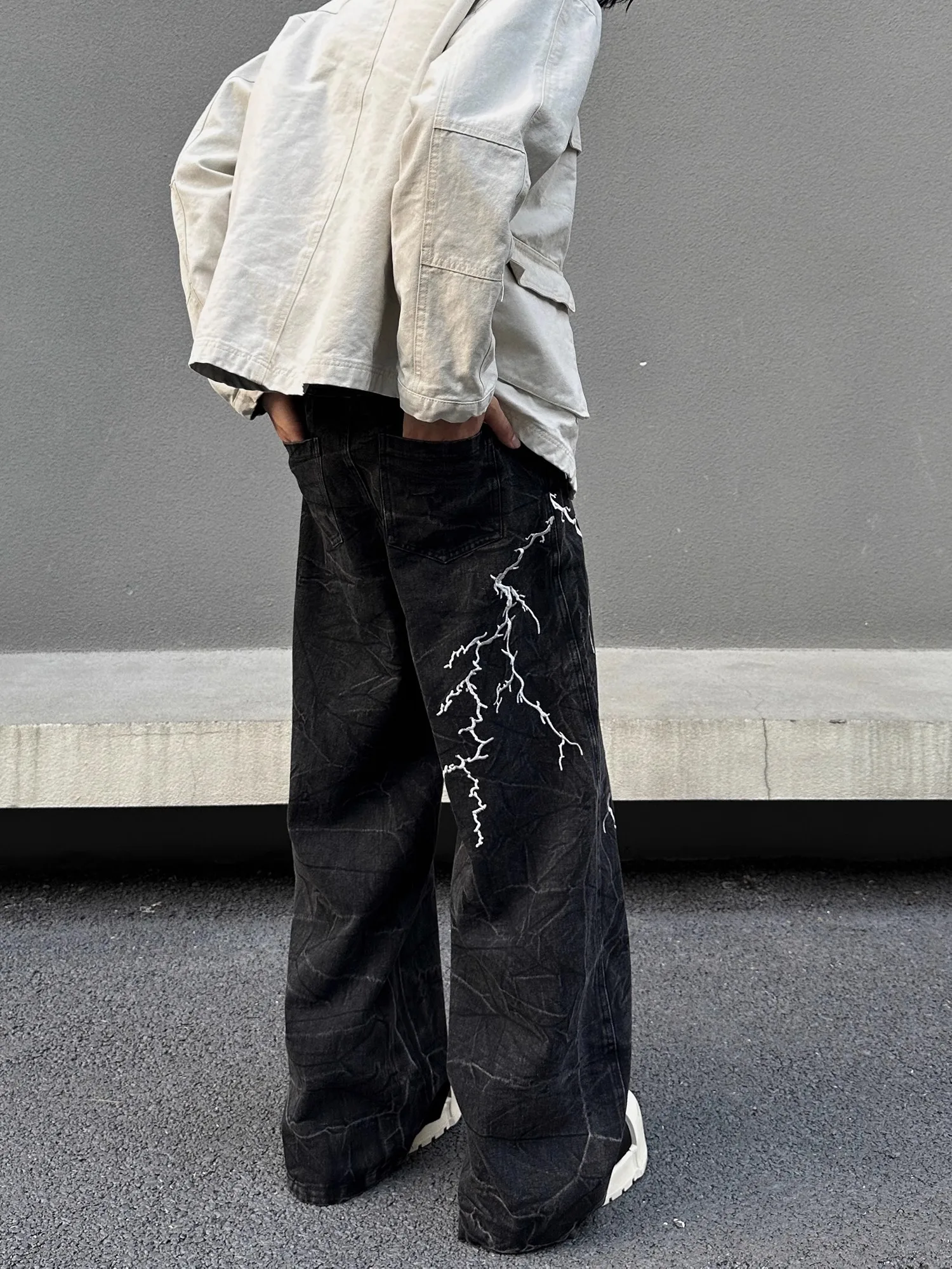 Amerikaanse retro straat geborduurde bliksem losse jeans heren dames hiphop klein ontwerp broek met rechte pijpen casual denim jeans