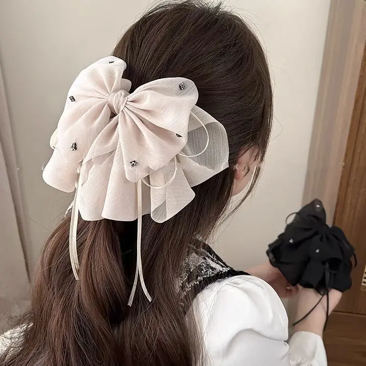 

Elegant women's new fashionable bow ponytail clip high-end fluffy hair roll grab clip temperament hair clip