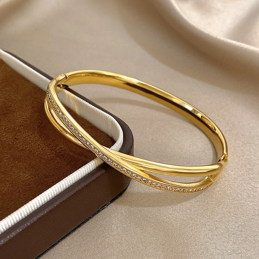

DODOHAO Elegant Simple Stainless Steel Cross Bracelet Bangle for Women Glossy Gold Color Wide Spring Opening Bangle Jewelry Gift