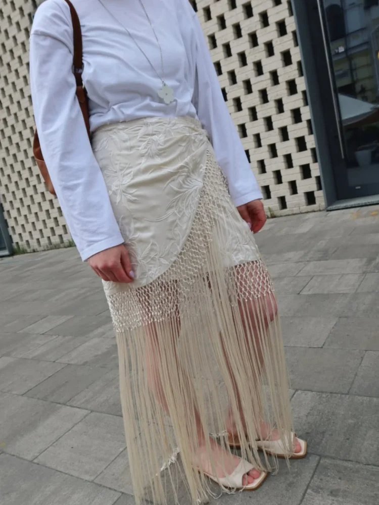 Falda larga con borlas a la moda para mujer, falda acampanada de una pieza a la cadera, faldas con dobladillo con flecos, ropa de abrigo de playa elegante para verano 2025