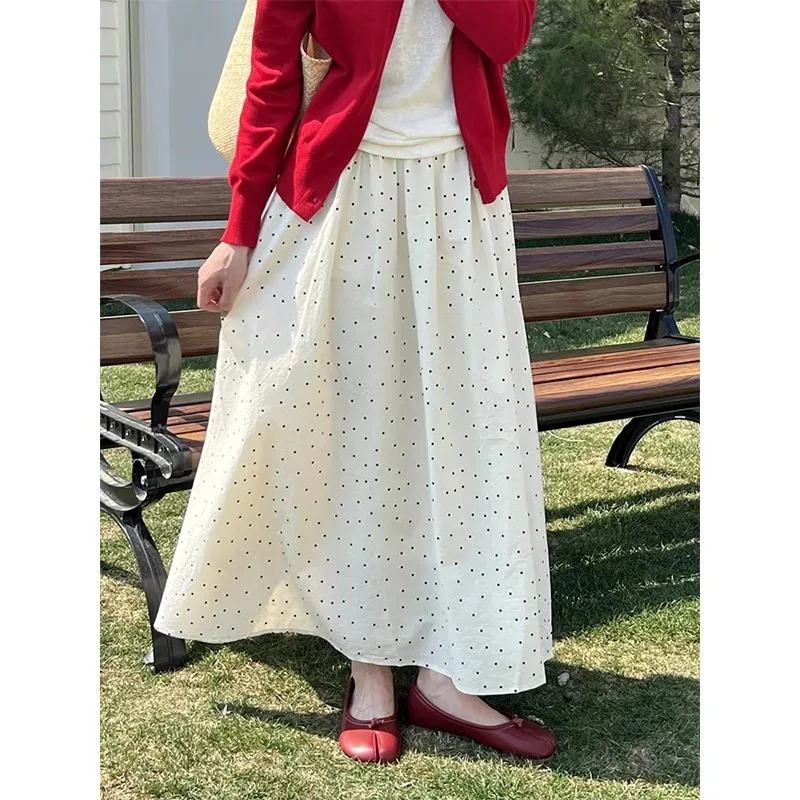 

Бежевая женская юбка-миди в горошек: струящаяся и элегантная