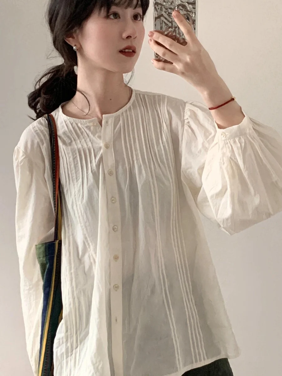 

Весна 2026: Новая модная блузка свободного кроя с рукавами-фонариками, круглым вырезом и многослойным дизайном. Однотонный топ с длинными рукавами для повседневной носки.