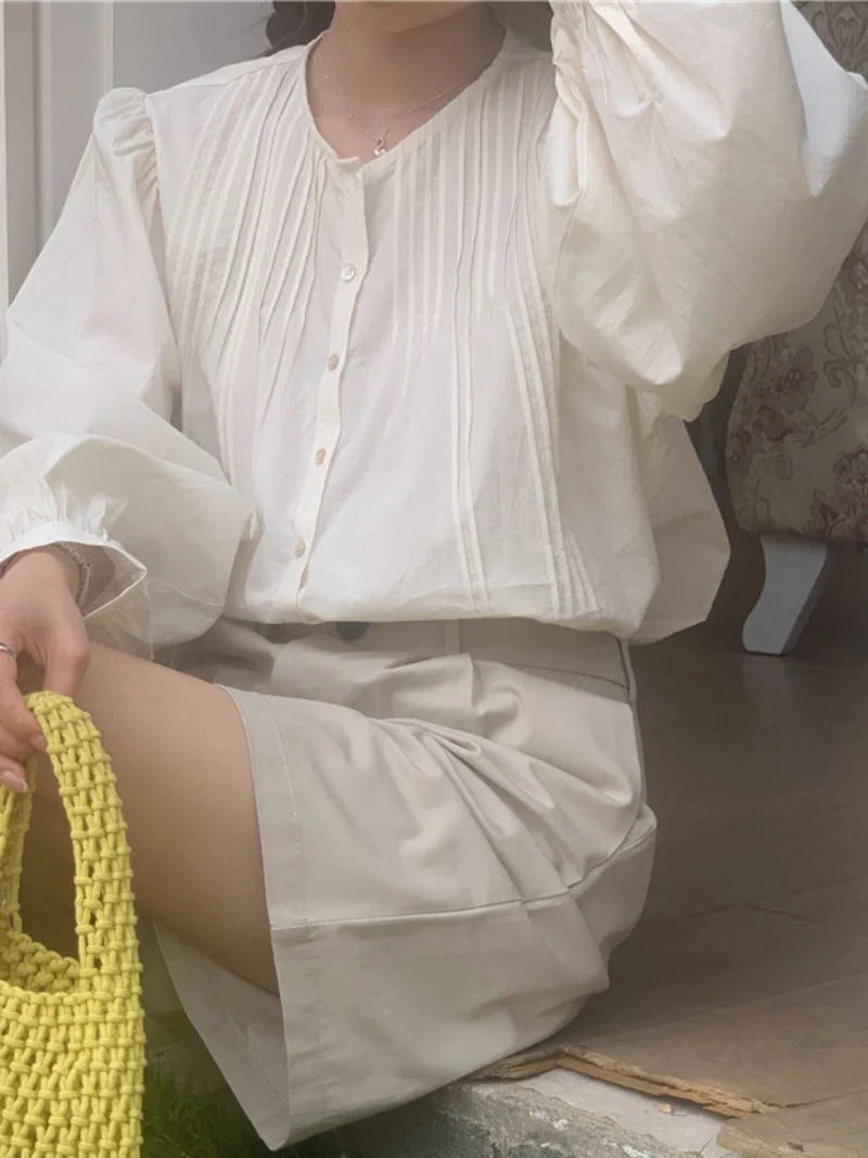 Chic Sweet round Ne Long Sve Loose Women's irt Design Sensation Bubble Sve Spring Top Korean Sle Commute Pure Color