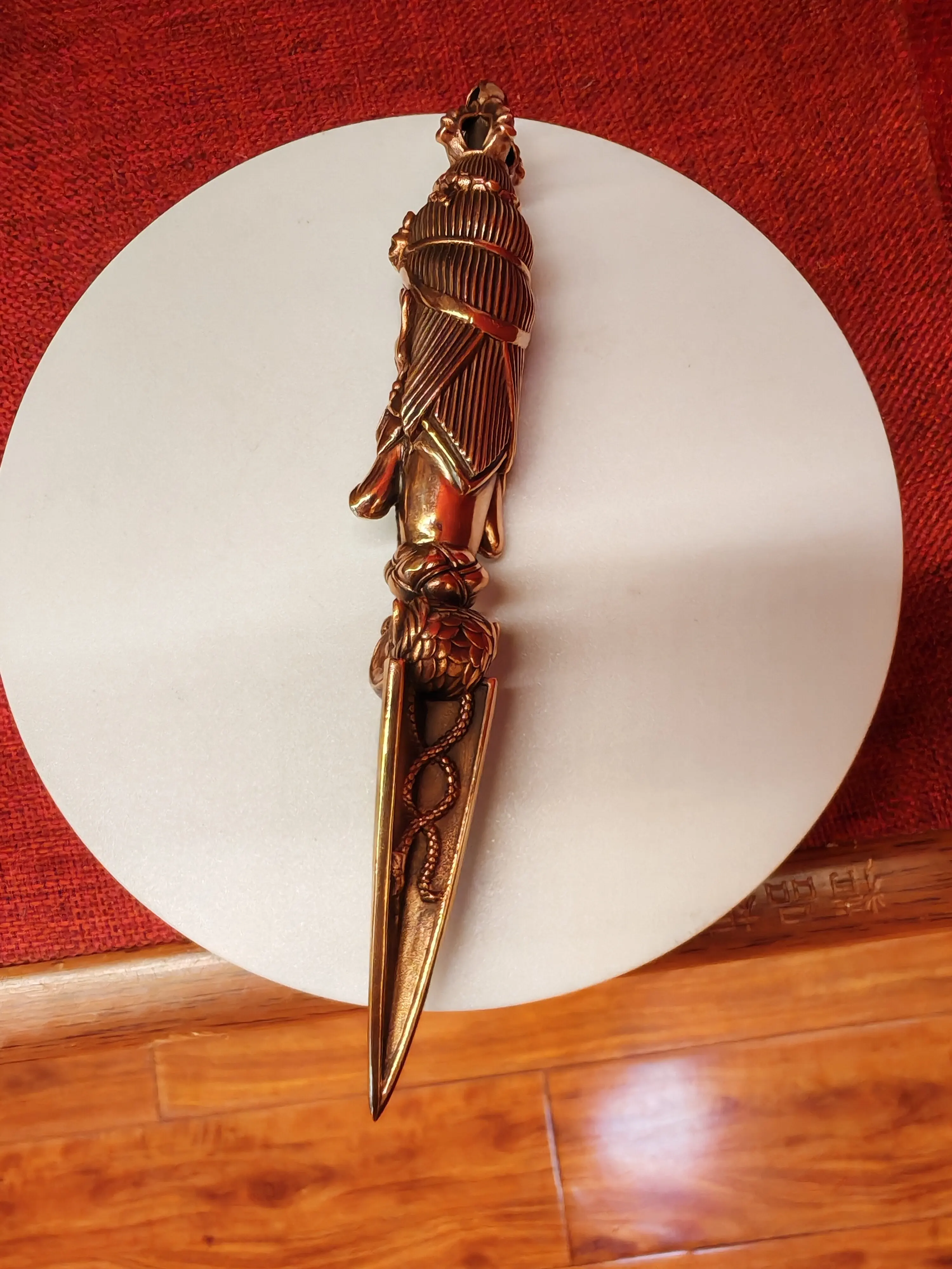 Pure copper diamond peel pendant is 5 inches long.