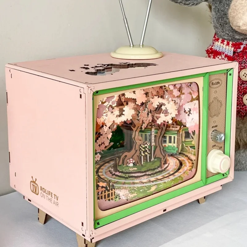 Robotime Rolife لتقوم بها بنفسك صندوق تشغيل الموسيقى ساكورا حالمة جولة ثلاثية الأبعاد لغز خشبي كتاب الزاوية التلفزيون أطقم منمذجة ديكور المنزل هدية عيد ميلاد عيد الميلاد