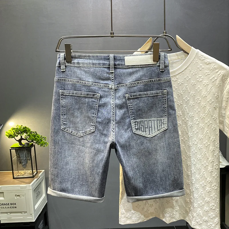 Celana denim robek untuk men2024summer mode baru cetak Pu Shuai semua cocok longgar lurus kasual celana crop kualitas tinggi